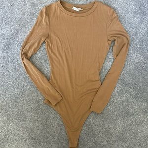 Nude long sleeve thong bodysuit